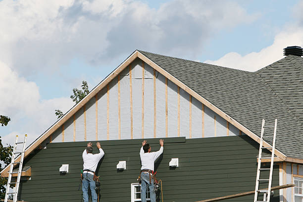 Professional Emergency Siding Repair technician working in Carey, OH
